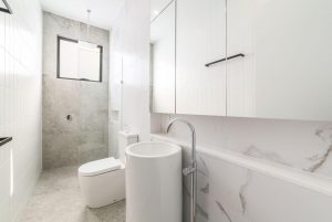 Professional cleaners cleaning bathroom in Redlands area of Brisbane